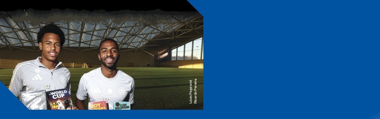 A banner showing two Leicester city players holding books while standing in the stadium to promote Leicester city libraries. The strapline reads: Leicester libraries go all in, if you live it, read it. The main text is: Leicester city footballers are joining Leicester libraries to support the national years of reading 2026. The link is leicester.gov.uk/libraries