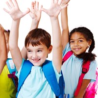 Clerk's corner * Happy children with arms in the air